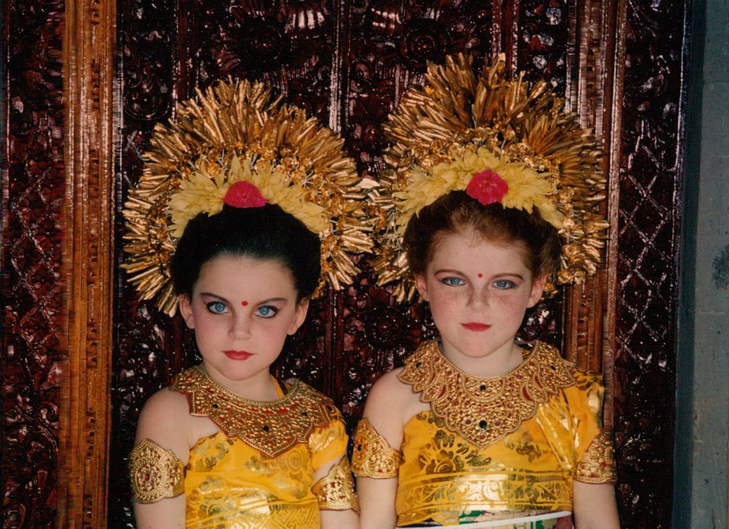 My sister and I in Balinese dress in Indonesia