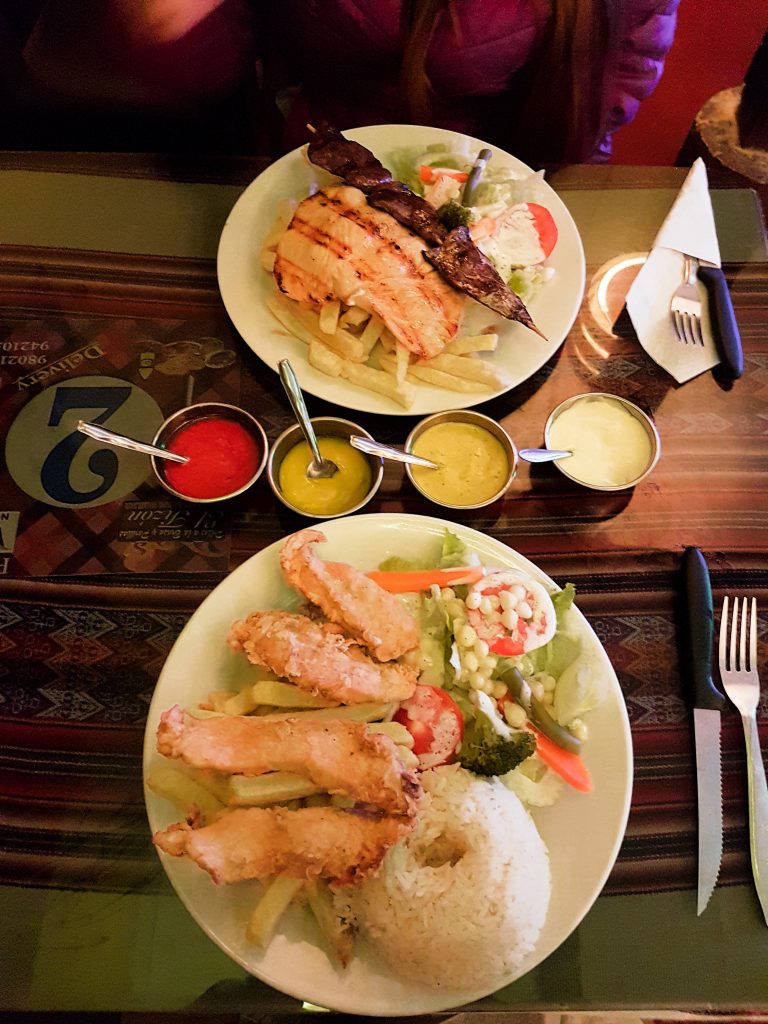 Indulging on some local chicharron de pollo and anticuchos at Pollos El Tizon