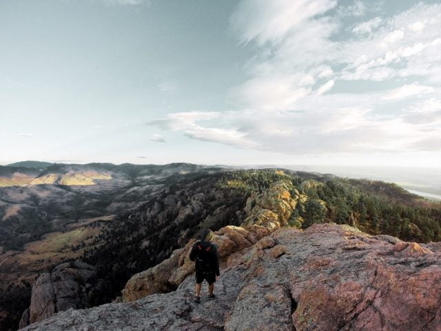 Climbing down off the rock after watching the sun come up