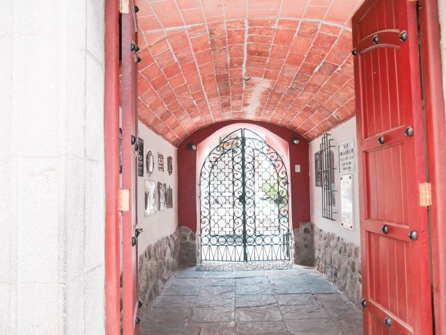 A red door marks the entry to the old house of Bolivian leader Pedro Domingo Murillo. This is now a museum in his honor.