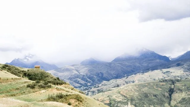 One of the many small houses sitting on the hillside overlooking the mountains