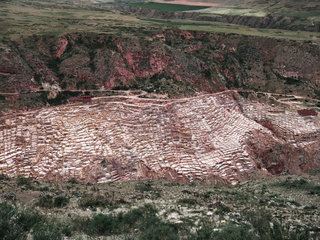 The many salt mines on the hillside are still used by community members today