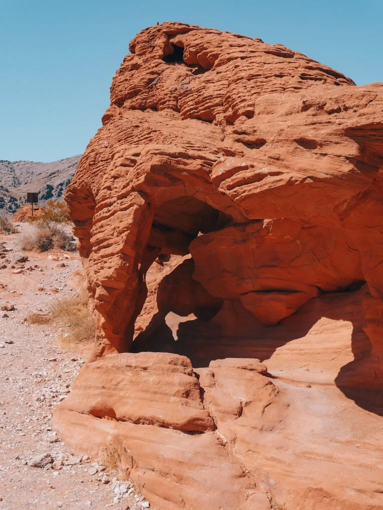 A beehive rock with an arch formed in it