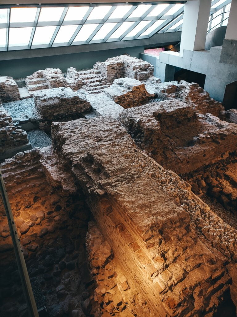 Foundations of the old castle seen inside the museum