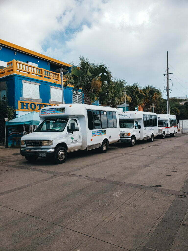 The shuttles waiting outside the ferry terminal