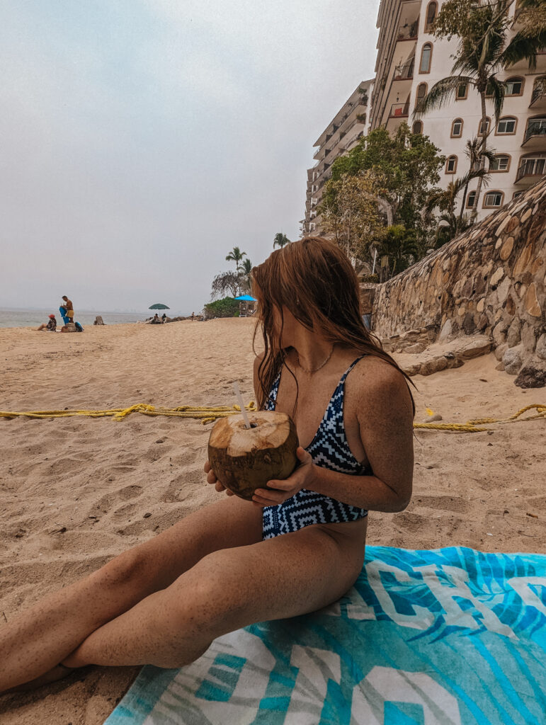 Enjoying a coconut at Playa Las Gemelas