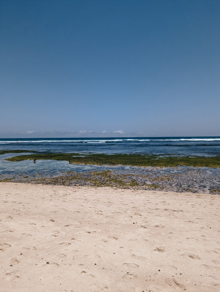 There are some shallow, sandy pools among the rocks perfect for a dip