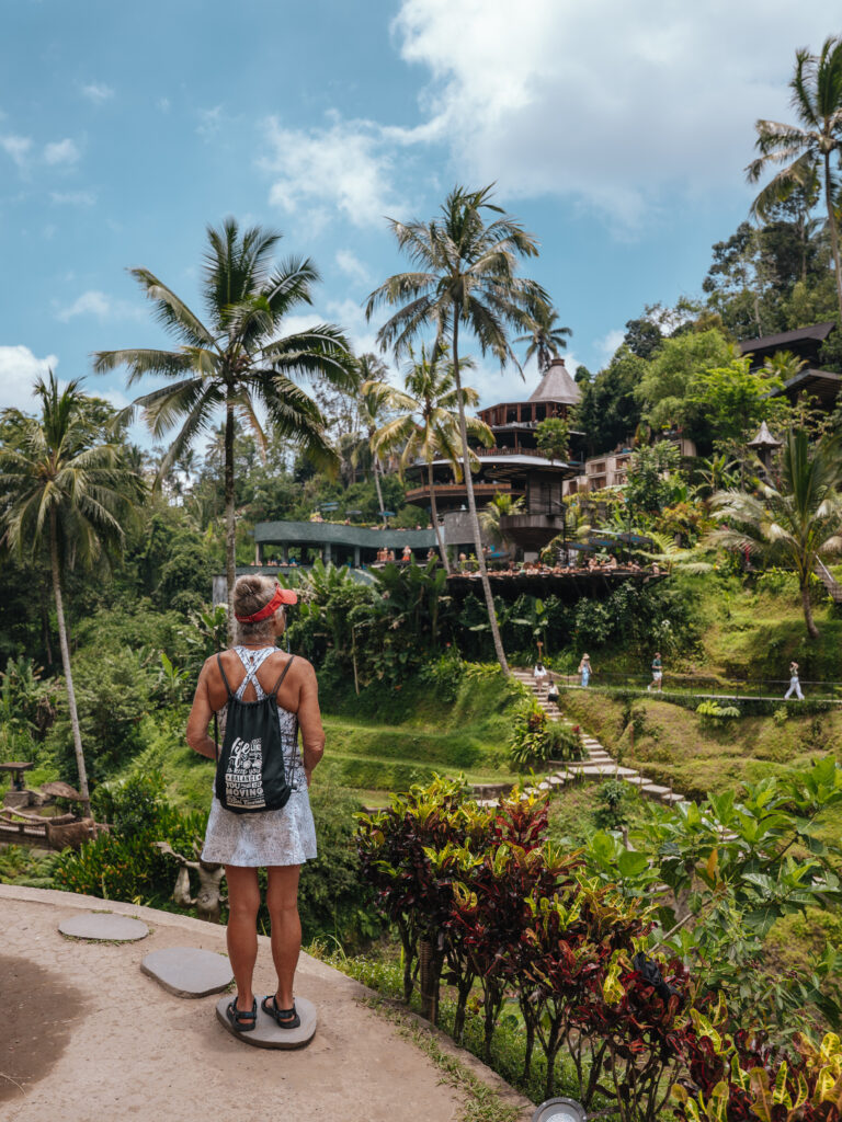 Lia's mom looking at Cretya Ubud from the rice terrace paths below