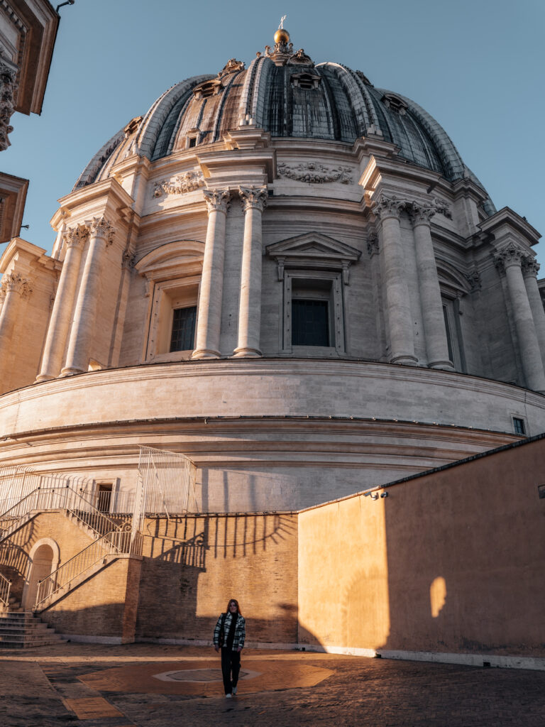 Lia walking on the terrace in front of the dome