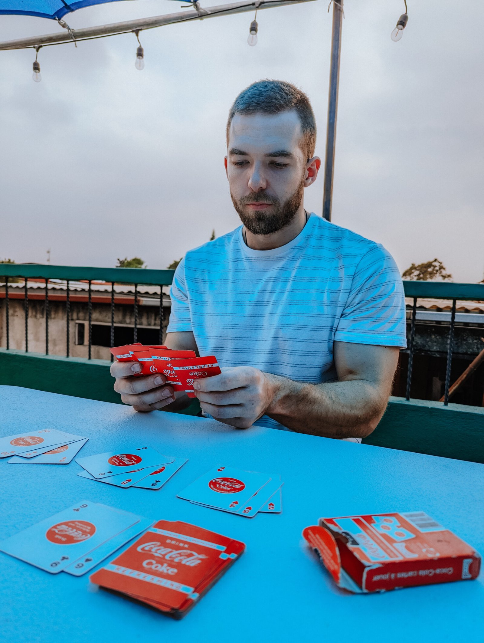 Playing cards on the rooftop of our hostel