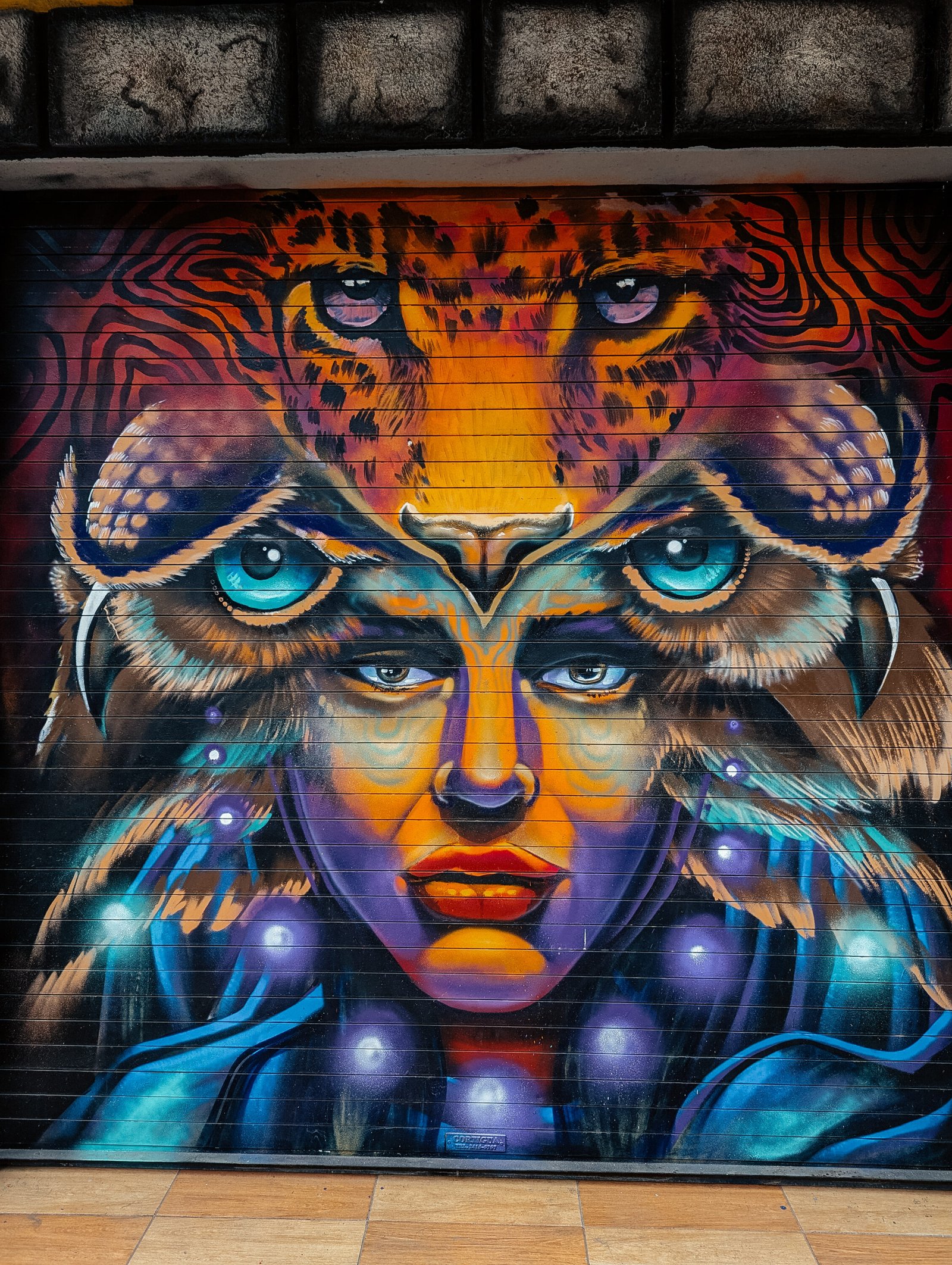 A colorful face mural - San Pedro La Laguna
