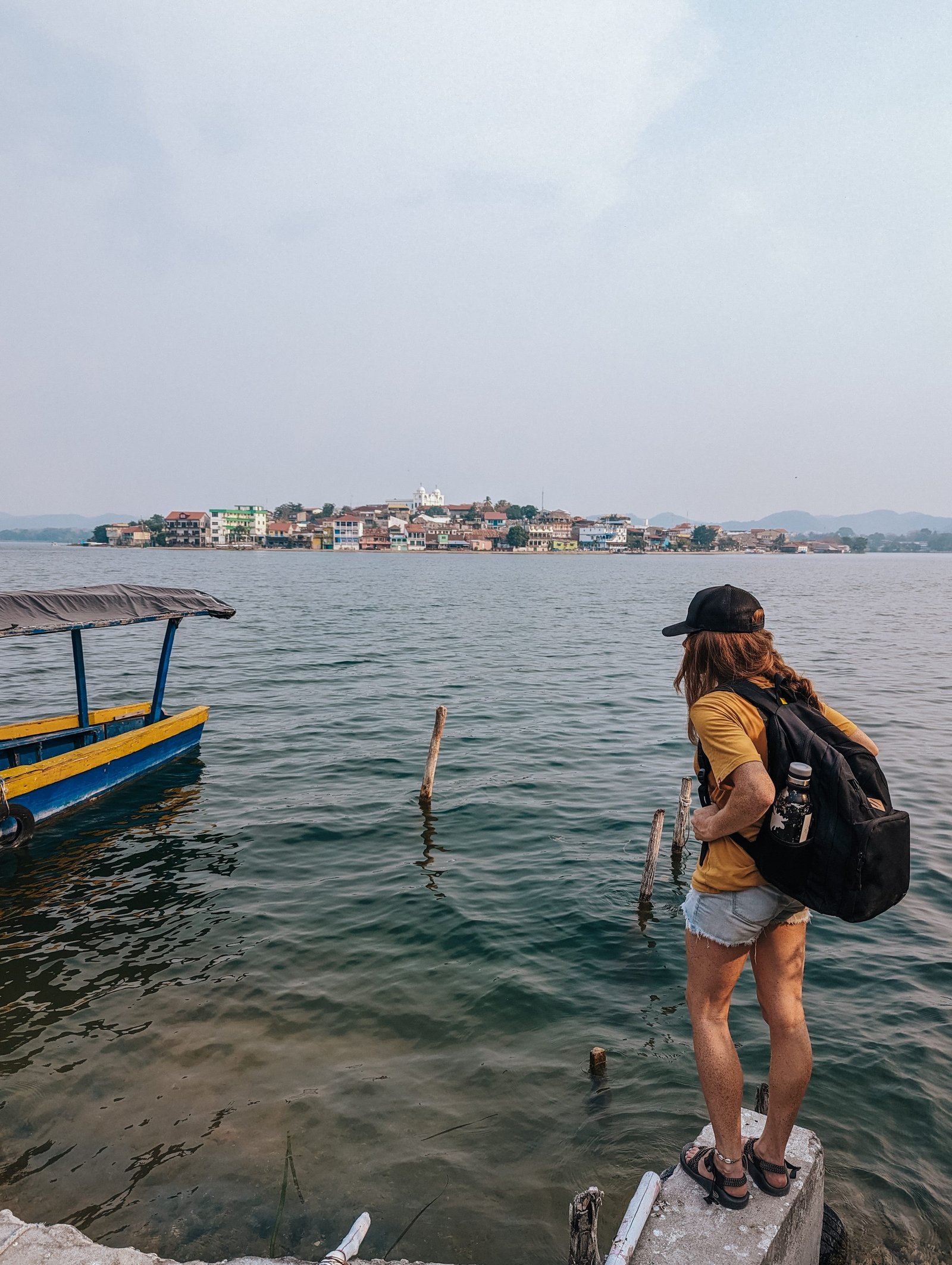 Lia waiting to catch a lancha back to Flores