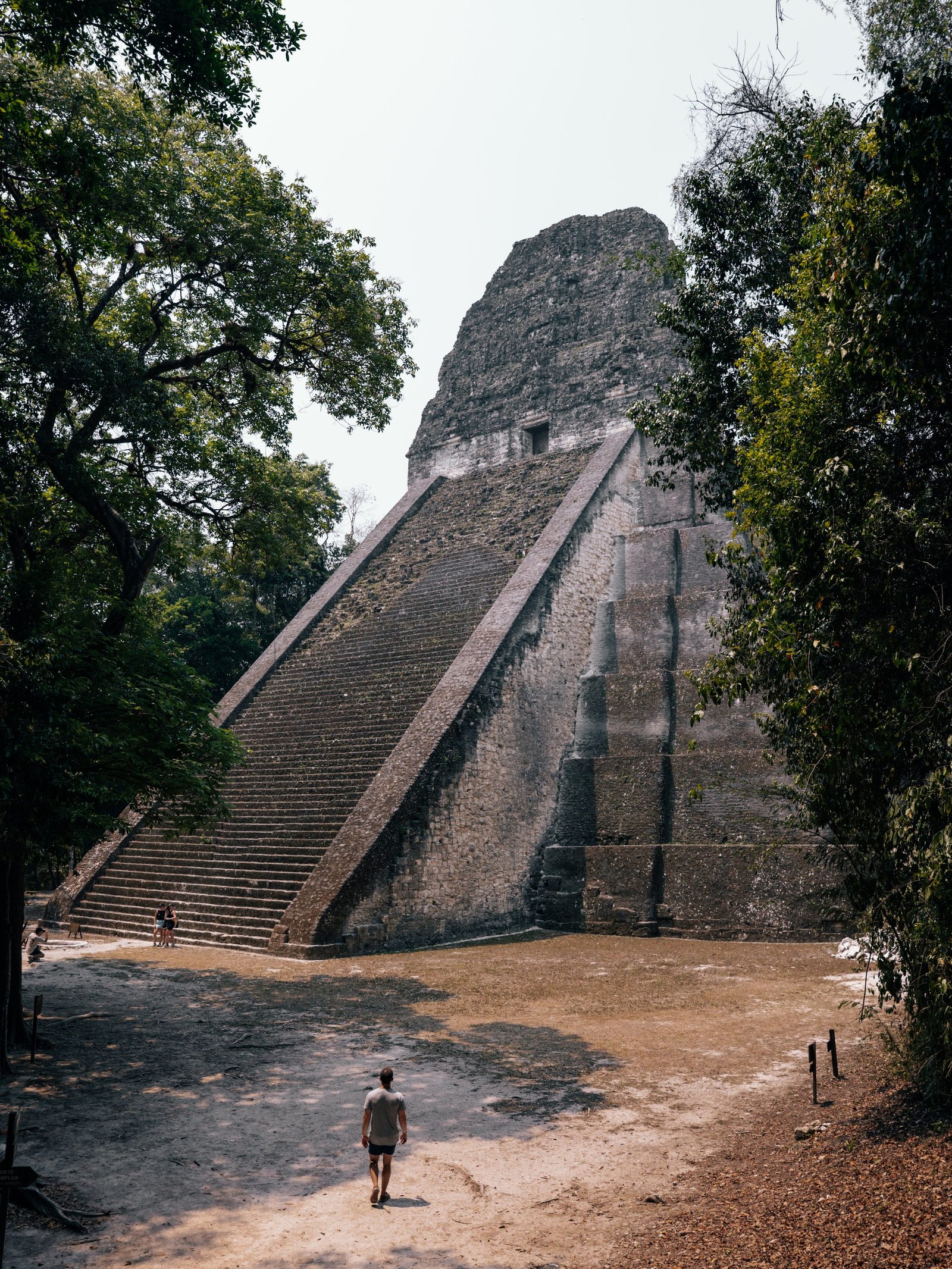 Matt standing below a pyramid in Tikal National Park
